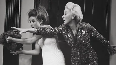 Shutterstock The scene in which Neely grabs Helen Lawson’s wig in the ladies’ powder room is one of the great comic set pieces of both the novel and the film (Credit: Shutterstock)