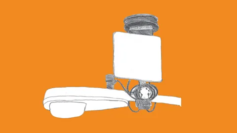 Ingrid Burrington A ShotSpotter acoustic sensor to detect gunshots, perched on a street light. They are needed because fewer people are reporting gunfire to the police (Credit: Ingrid Burrington)