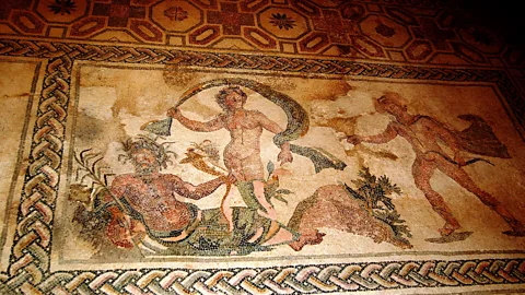 Andrea Watson Some of the mosaics that remain from the Nea Paphos temple site depict erotic images from Greek mythology – such as the story of Apollo and Daphne (Credit: Andrea Watson)