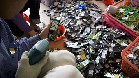 Getty Images From phones to computers, Guiyu in China processes much of the world's e-waste - in 2008, up to 80% of material processed there came from overseas (Credit: Getty Images)