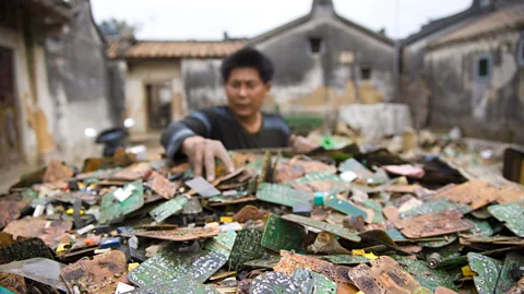 Getty Images Electronic devices contain many precious metals and rare earth elements, but much of it is extracted in polluting, toxic places such as Guiyu in China (Credit: Getty Images)