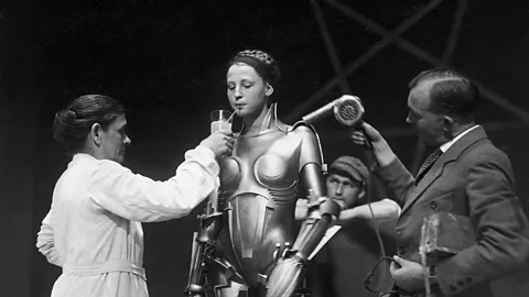 Kino Lorber Fritz Lang’s Metropolis may have introduced onscreen the idea of the ‘sexy robot’ who seduces men – and enjoys a drink when the cameras aren’t rolling (Credit: Kino Lorber)
