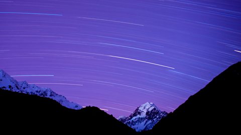 Long exposure of night sky over Aoraki Mount Cook National Park, robertharding / Alamy Stock Photo