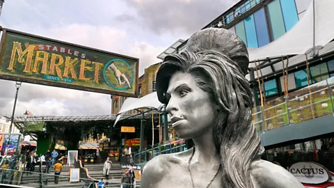 Alamy Winehouse is revered – as expressed through a statue at London’s Camden Stables Market (Credit: Alamy)