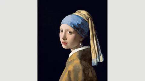 Wikipedia Johannes Vermeer also conjured the illusion of shininess with a few strokes of white paint in his Girl with a Pearl Earring (c 1665) (Credit: Wikipedia)