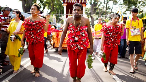 AFP/Stringer/Getty Thaipusam, a Hindu festival, is one of the religious events that attracts people of all faiths in Malaysia (Credit: AFP/Stringer/Getty)
