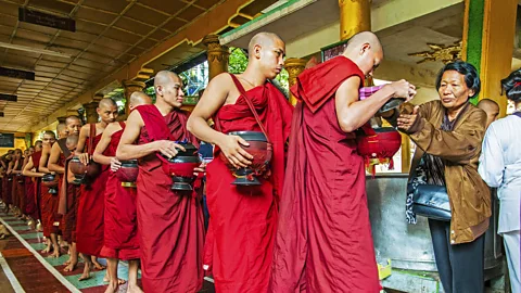 Stefano Politi Markovina In Burma, donating food to monks is a common practice under the Buddhist tradition (Credit: Stefano Politi Markovina)