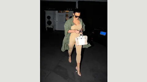 Getty Images Kim Kardashian has spoken about having to dye a Lan Yu Couture dress with Earl Grey tea bags to match her skin tone (Credit: Getty Images)