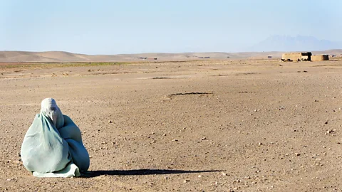 Alamy This image shows an Afghan woman at a checkpoint in Helmand province: landays have been passed mouth to mouth among Pashtun people for at least 1,000 years. (Credit: Alamy)