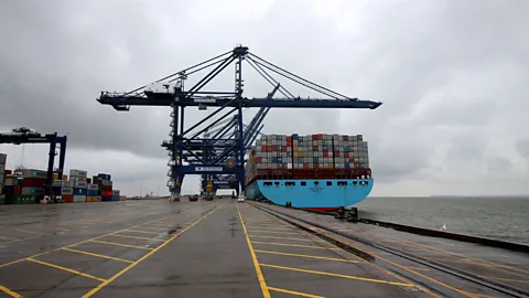 Chris Baraniuk Container ships are gargantuan steel beasts, each able to carry at least 10,000 containers (Credit: Chris Baraniuk)