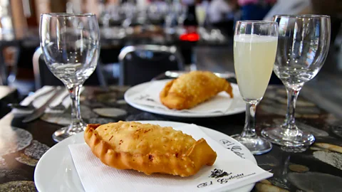 Ian Lloyd Neubauer El Galeon serves a fried empanada filled with cheese and Chilean king crab (Credit: Ian Lloyd Neubauer)