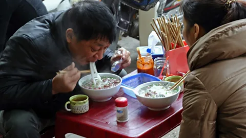 Hoang Dinh Nam/AFP/Getty Images Pho is an everyman’s dish that can be eaten at any meal (Credit: Hoang Dinh Nam/AFP/Getty Images)
