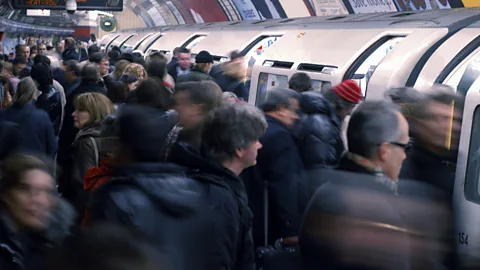 Getty Images Cycling can provide freedom from cramped public transport - but it has its drawbacks, too (Credit: Getty Images)