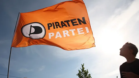 Getty Images The first Pirate Party was created in Sweden in 2006. Equivalents soon sprang up across Europe - including Germany (pictured) - and in the US and Australia (Credit: Getty Images)