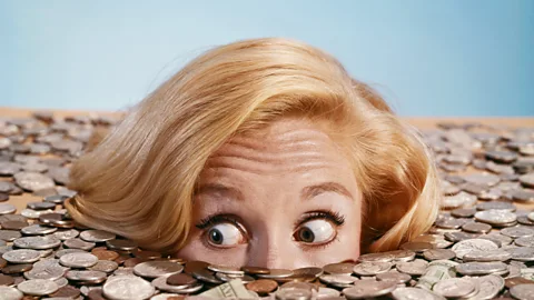 Alamy Money is a much smaller driver of happiness at work than we think. (Credit: Alamy)