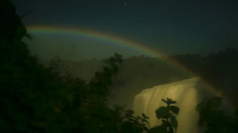 br0wser/Flickr Moonbows are also regularly seen at Victoria Falls, on the Zambia-Zimbabwe border (Credit: br0wser/Flickr)
