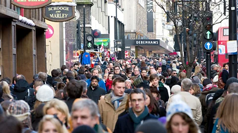 Alamy Christmas shoppers on Oxford Street in London (Credit: Alamy)