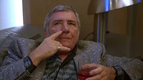 Braveworld/TriStar Damon Killian, the host of the show, was intended to be a personification of the media’s ability to manipulate the public and the power of celebrity (Credit: Braveworld/TriStar)