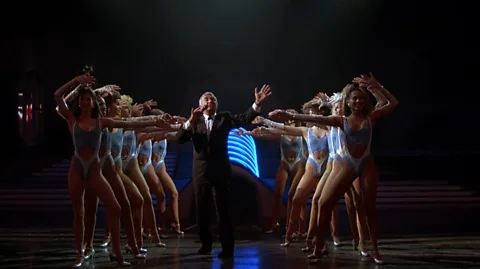 Braveworld/TriStar The strange, shimmering world of television game shows has blurred with politics in The Running Man (Credit: Braveworld/TriStar)