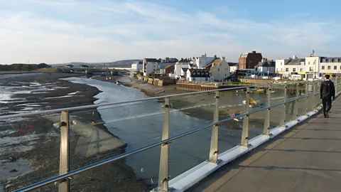 Norman Miller The old town of Shoreham lies just across this footbridge from the quirky homes of Riverbank (Credit: Norman Miller)