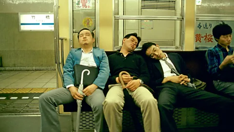 Alamy Marathon workdays are so entrenched in Japanese culture that there’s even a word, karoshi, that quite literally means “overwork death” (Credit: Alamy)