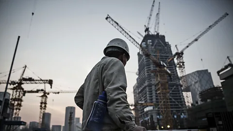 Getty Images "On construction sites, cranes are often controlled remotely by people on the ground - but you could have the operator working from overseas" (Credit: Getty Images)