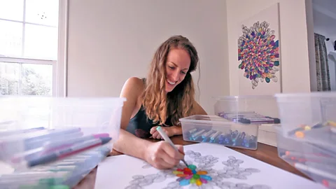 Map Your Progress Amy Jones started selling goal-tracking art after a visual aid helped her pay off $26,000 in debt. Each swirl on her canvas represented $100 paid off (Credit: Map Your Progress)