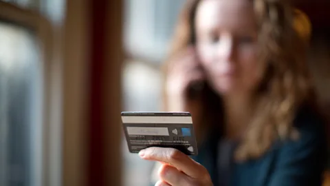 Getty Images If someone is unusually hesitant when entering their banking details online it could be a sign that they are under duress (Credit: Getty Images)