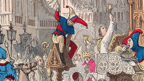 Alamy Medieval European rulers staged annual Feasts of Fools to allow their subjects to blow off steam by making fun of them (Credit: Alamy)
