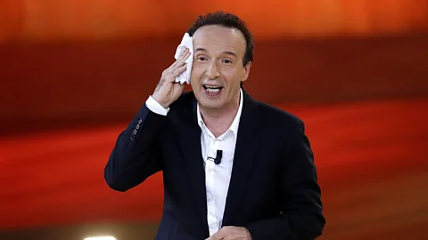 Alamy Enzo Biagi's TV programme was taken off the air following an interview with Roberto Benigni (pictured) in which both laughed at Silvio Berlusconi (Credit: Alamy)