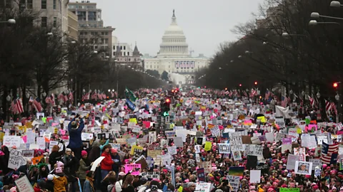 Getty Images Protesters at the Women's March on Washington on January 21 in Washington, DC. Some companies are giving employees paid time off for political activism (Credit: Getty Images)