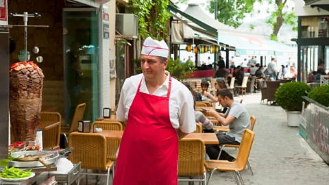 Hackenberg/ullstein bild/Getty Eateries and cafes alike sell the beloved street snack (Credit: Hackenberg/ullstein bild/Getty)