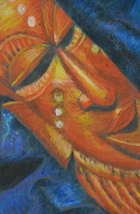 Student oil pastel painting of an orange mask