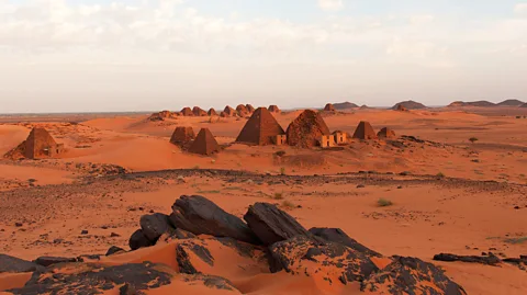 imageBROKER/Alamy Sun setting on Sudanese pyramids (Credit: imageBROKER/Alamy)