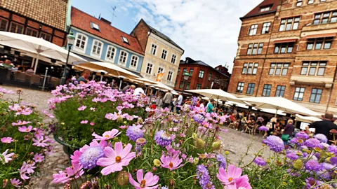 Alamy Lilla Torg Square, where people in Malmo walk and enjoy outdoor meals (Credit: Alamy)