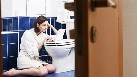 Alamy Parents working from home find unusual places to work, from garages to bathrooms (Credit: Alamy)