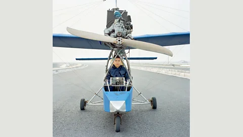 Xiaoxiao Xu Wang built model planes out of bamboo from the forest behind his house – which were burnt as firewood by his mother – before constructing his first aircraft (Credit: Xiaoxiao Xu)