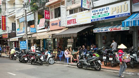 Kevin Hellon/Alamy District One is popular among expats for its downtown feel (Credit: Kevin Hellon/Alamy)