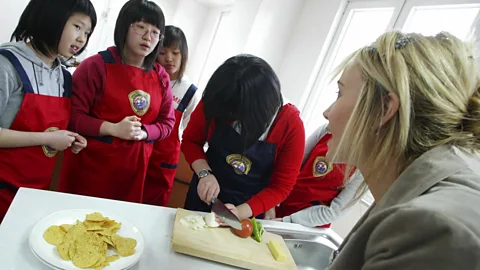 Getty Images Outside the military, the biggest employer of English-speaking expats is the education industry (Credit: Getty Images)