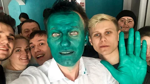 The man with the green face