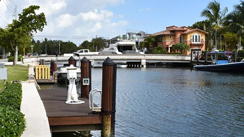 Amanda Ruggeri With its varying seawall heights, new decks and bridge, this corner of Fort Lauderdale shows the domino effect of changing one piece of infrastructure (Credit: Amanda Ruggeri)