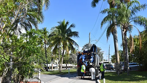 Amanda Ruggeri As these workers show, each valve comes with more of an expense than its purchase price; it also needs to be regularly inspected and maintained (Credit: Amanda Ruggeri)