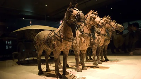 Alamy Terracotta horses, carts and chariots were also carved and buried to guard the emperor’s tomb (Credit: Alamy)