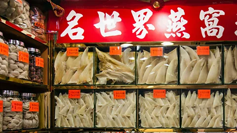 Alamy Shelves of dried shark fins are common in Hong Kong's Sheung Wan district - but it can be very hard to tell whether the goods come from protected species (Credit: Alamy)
