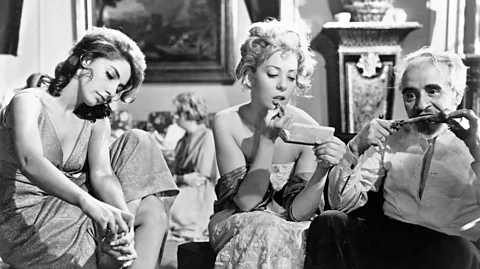 Alamy The guests strip off their gowns and jackets and let it all hang out as the social order collapses (Credit: Alamy)