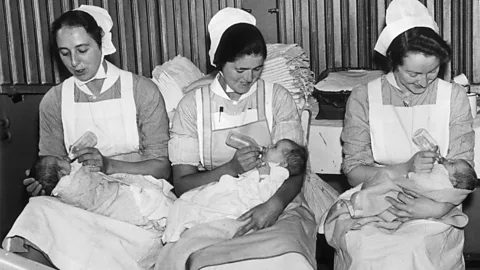 Getty Images Before the benefits of breastfeeding became apparent, doctors and nurses once encouraged the use of formula milk (Credit: Getty Images)