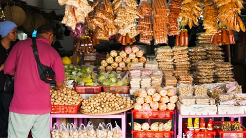 Will Steeley/Alamy Amid the offerings at the Kota Kinabalu market, lemang periuk kera isn’t the type of snack that catches attention (Credit: Will Steeley/Alamy)