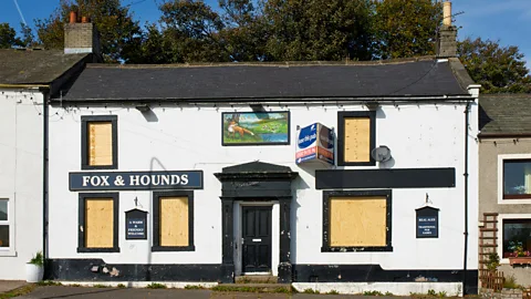 Alamy The Fox and Hounds pub shuttered in 2010 – but has remained open ever since it was purchased by the local community the following year (Credit: Alamy)