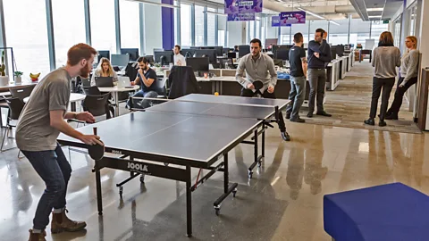Getty Images Working next to areas where colleagues come to play games is often an irksome distraction for some workers (Credit: Getty Images)