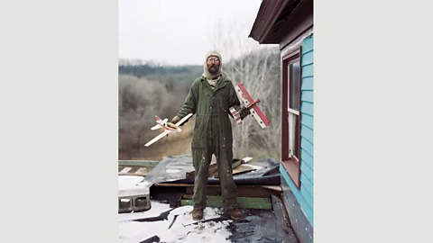 Alec Soth From Soth’s Sleeping by the Mississippi series, this photo shows a man called Charles on the roof of his home in Vasa, Minnesota (Credit: Alec Soth)